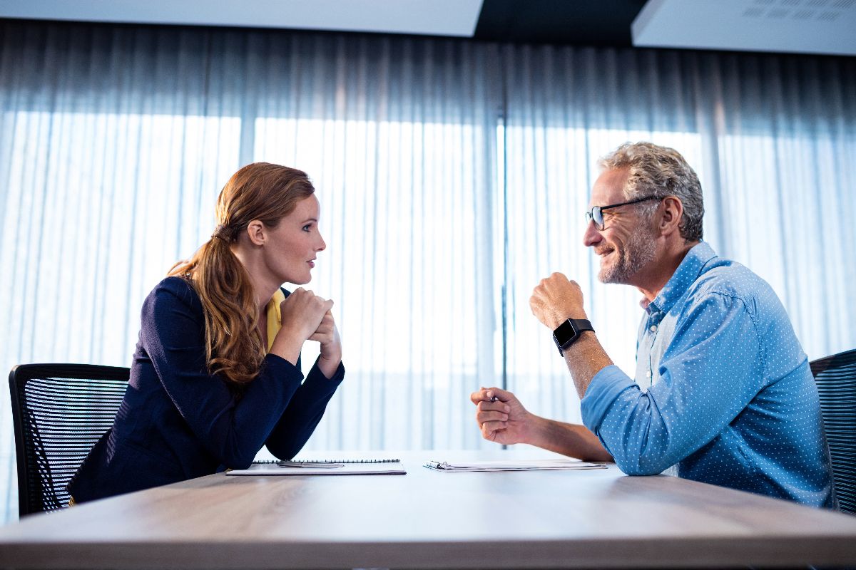 Woman listening to man